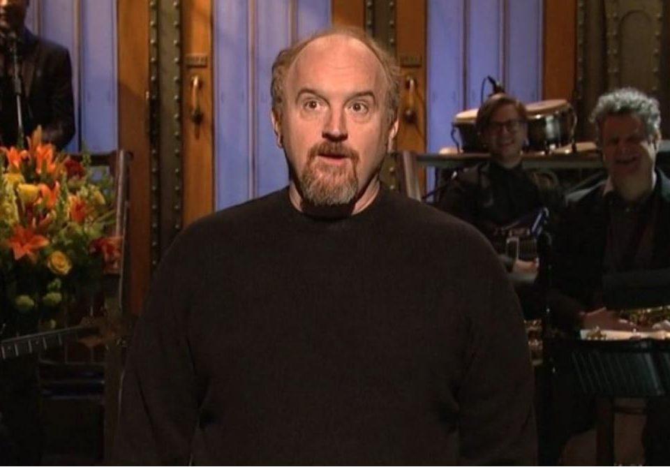 Photo still of Louis C.K. on SNL featured in the "Louis C.K.’s Controversial Monologue: He's Laughing All The Way to the Bank" blog.
