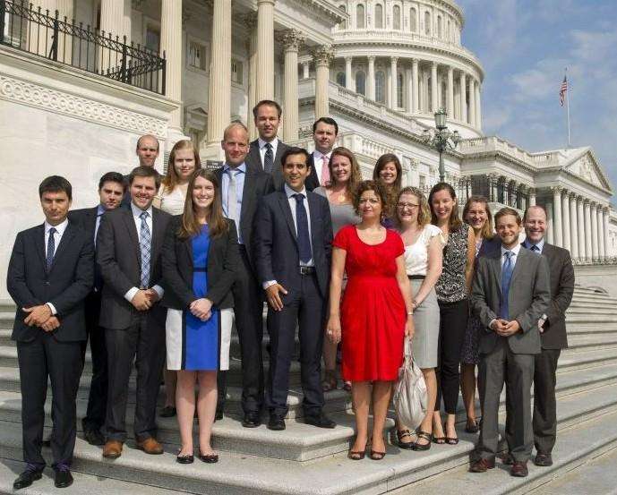 Group of staffers standing outside of Congress featured in the "Why Are Men in Congress Still Sidelining Women Staffers?" blog.